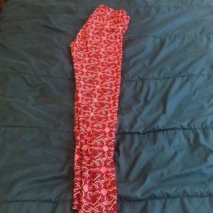 Pink and red lularoe leggings.